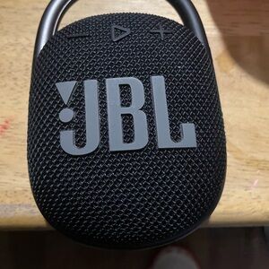 JBL black and gray clip on Bluetooth speaker